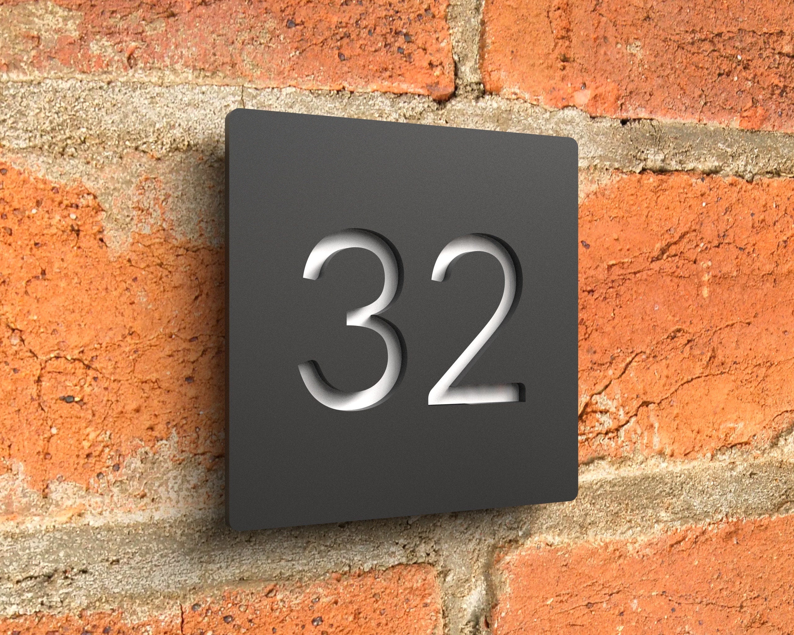 Modern floating house number sign